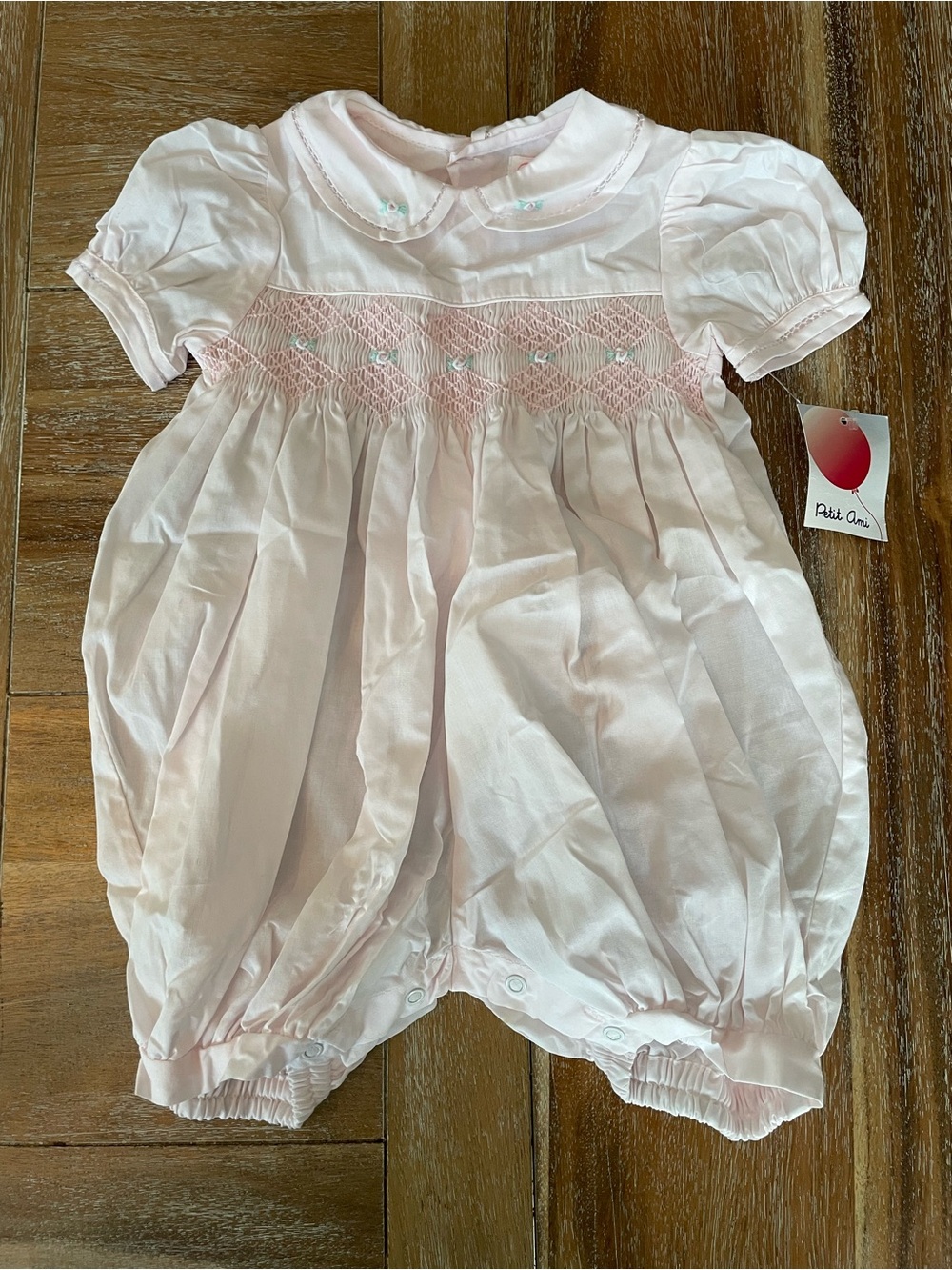 Petit Ami Light Pink Smocked Bubble Romper with Embroidery